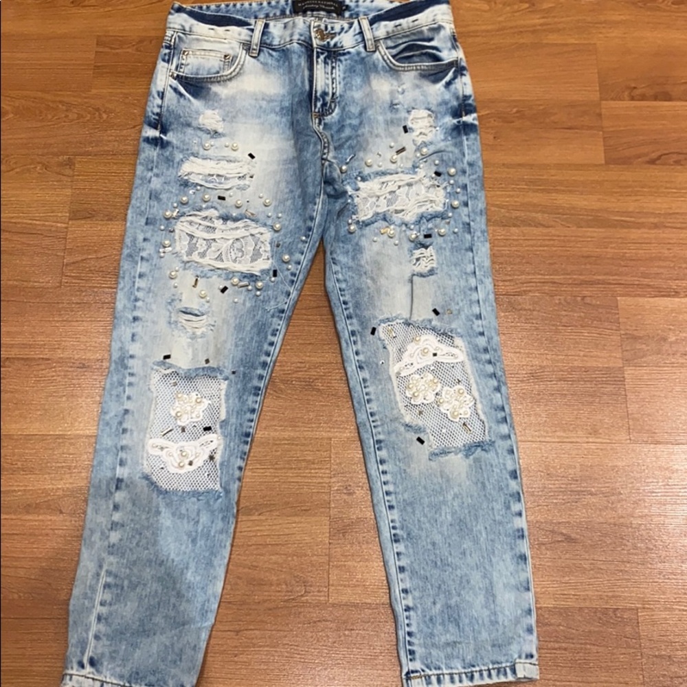Beautiful jeans with lots of gemstones.